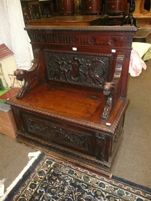 Lot 474 - A Victorian carved walnut and pine box seat settle