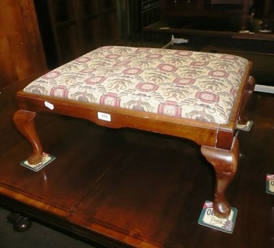 Lot 478 - A walnut footstool with a wool work top