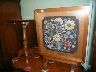 Lot 495 - A Victorian walnut pedestal tripod table and an embroidered tilt top firescreen/table