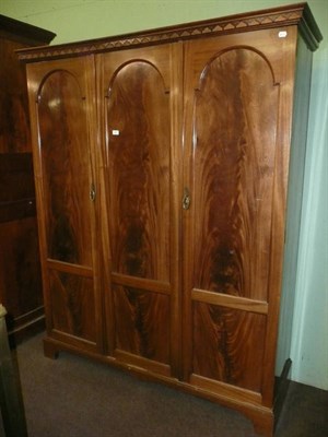 Lot 497 - Early 20th century mahogany triple wardrobe