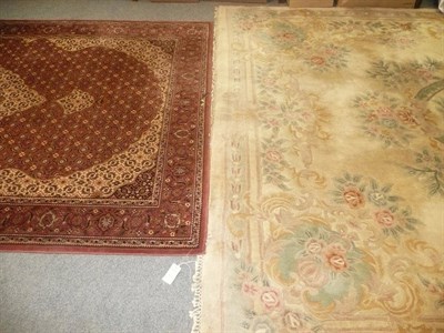 Lot 533 - A Persian style red ground rug and Chinese cream ground floral hall carpet