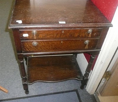 Lot 567 - Oak two drawer canteen table