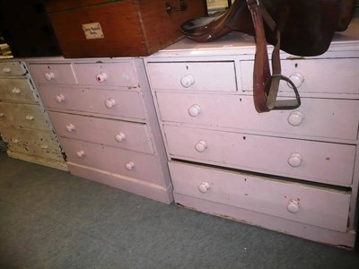 Lot 578 - Two pink painted pine chests of drawers