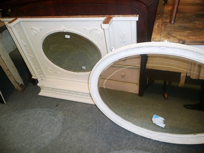 Lot 592 - White painted oval mirror and a similar over mantel