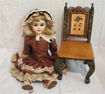 Lot 1004 - Gebruder Kuhlenz Bisque Socket Head Doll impressed '165', with a replacement blond wig,...