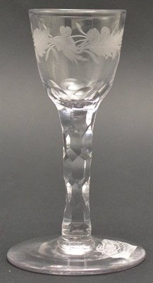 Lot 4 - An Emblems of the Union Wine Glass, circa 1780, the rounded funnel bowl engraved with roses,...