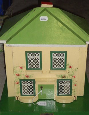 Lot 1011 - Small Circa 1940's Amersham Dolls House with cream painted wooden facade,  tin windows in green...