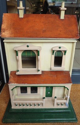 Lot 1033 - Circa 1910 G & J Lines No 30 Dolls House with a papered  tile roof, balustraded veranda to the...