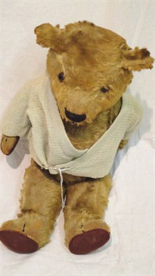 Lot 1037 - Circa 1930's Yellow Plush Jointed Teddy Bear with black horizontal stitched nose, replacement brown