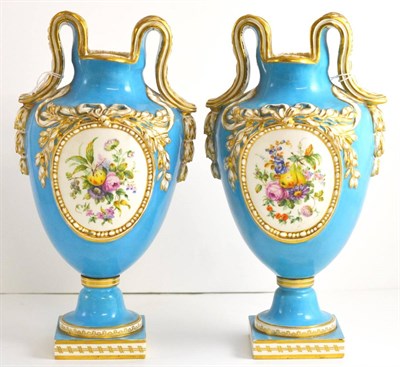 Lot 29 - A Pair of Coalbrookdale Porcelain Twin-Handled Vases, circa 1840, of urn form, painted with...
