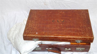 Lot 1041 - Circa 1940's Brown Crocodile Leather Suitcase initialled C L-J and a large linen cloth with a...