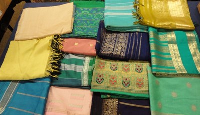 Lot 1060 - Twenty Assorted Woven And Printed Coloured Silk Saris