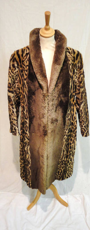 Lot 1079 - Druckers Of Belfast Ocelot Coat With Phantom Beaver Trims (with valuation for insurance).