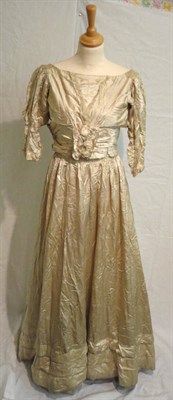 Lot 1113 - Late 19th Century Cream Silk Two Piece Wedding Outfit with fitted bodice incorporating a V...