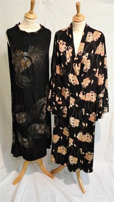 Lot 1115 - Circa 1920's Black Chiffon And Beaded Shift Dress decorated with whorls of silver and gold...