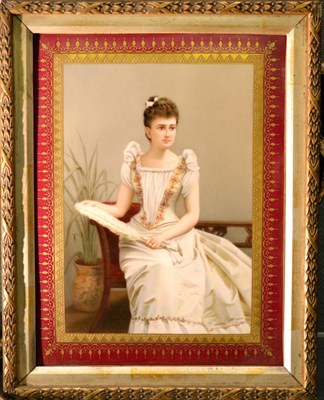 Lot 53 - A Vienna Style Porcelain Plaque, circa 1900, decorated with a portrait of a seated lady within...
