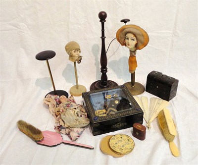 Lot 1143 - Two Circa 1920's Hat Stands With Painted Plaster Ladies Heads wearing felt hats and side...