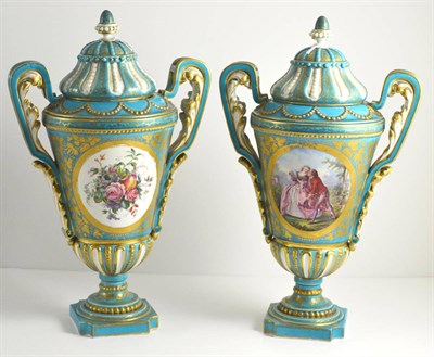 Lot 56 - A Pair of Sèvres Style Porcelain Urn Shaped Vases and Covers, circa 1900, with leaf sheathed...