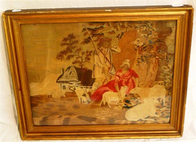 Lot 1173 - Early 19th Century Wool Embroidered Silk Picture depicting a shepherd and shepherdess tending...