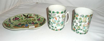 Lot 11 - A pair of Chinese famille verte mugs and a famille rose dish