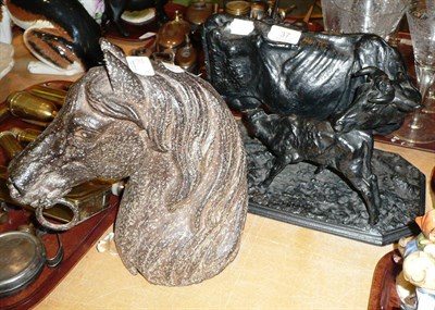 Lot 37 - Victorian cast figure of a horses head, a figure of a horses head and a figure group of cattle