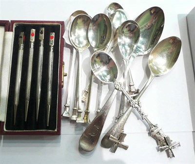 Lot 86 - Twelve assorted silver teaspoons and a set of bridge pencils