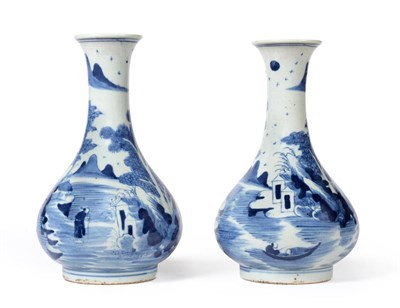 Lot 87 - A Pair of Chinese Porcelain Bottle Vases, 17th century, painted in underglaze blue with mirror...