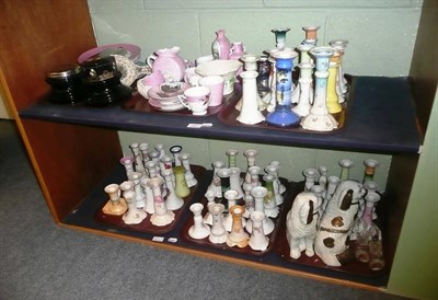 Lot 127 - A collection of assorted ceramic candlesticks and pink lustre, etc, on two shelves