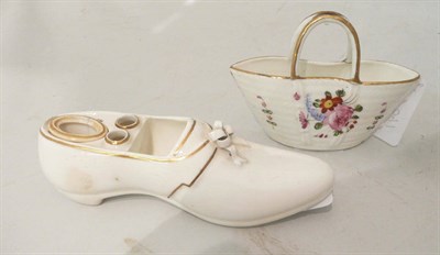 Lot 160 - A Rockingham china shoe and a flower decorated china basket