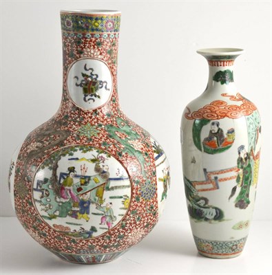 Lot 99 - A Chinese Porcelain Bottle Vase, bears Kangxi reign mark, painted in famille verte enamels with...