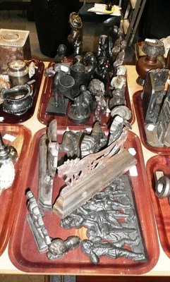 Lot 173 - Two trays of assorted metal door stops, figures and spill holders