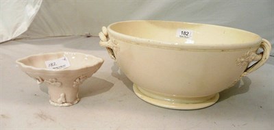 Lot 182 - A Leeds Creamware double handled bowl and a Blanc de Chine libation cup (2)