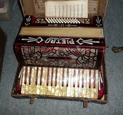 Lot 194 - A cased piano accordion