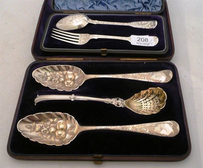 Lot 208 - A cased set of two silver berry spoons and the conforming sugar sifter spoon also a cased...