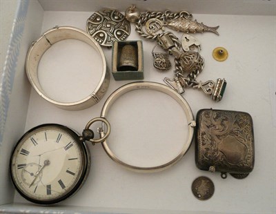 Lot 228 - Silver charm bracelet, two silver bangles, a silver vesta, silver pocket watch, etc