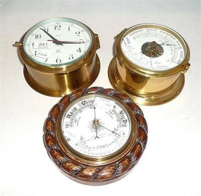 Lot 241 - Brass smiths wall clock, brass barometer signed Schatz and a circular oak-cased aneroid barometer