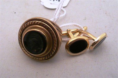 Lot 285 - A pair of 9ct gold cufflinks and a 9ct gold ring