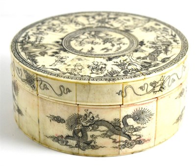Lot 130 - A Chinese Bone Circular Box and Cover, 19th century, decorated en grisaille with boys and...