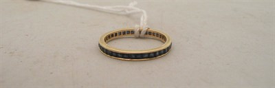 Lot 287 - An 18ct gold sapphire full eternity ring