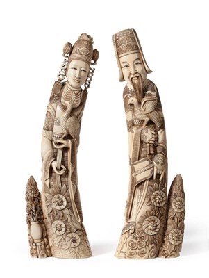 Lot 135 - A Pair of Japanese Ivory Tusk Carvings, circa 1950-60, as deities, each in long robes holding a...