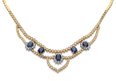 Lot 225 - A Sapphire and Diamond Necklace, yellow round disk links with collet set round brilliant cut...