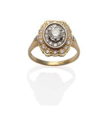 Lot 237 - An 18 Carat Gold Diamond Cluster Ring, the barrel shaped cluster comprising a central round...