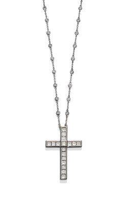 Lot 238 - A Diamond Cross on Chain, princess cut diamonds in white channel settings form the cross, total...