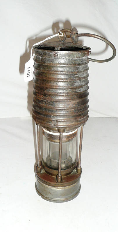 Lot 1011 - A Patterson Type HCP 9 Miner's Lamp, numbered '29', with corrugated metal hood