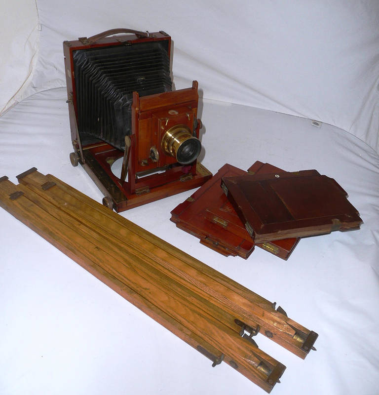 Lot 1211 - A Thornton Pickard 'Imperial' Mahogany & Brass Field Camera, circa 1904, half plate triple...