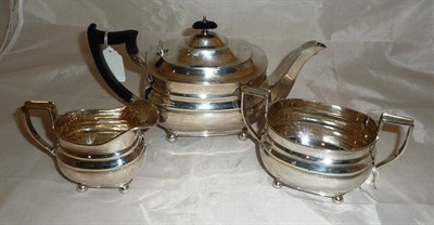 Lot 10 - A three piece silver tea set, approximately 36oz