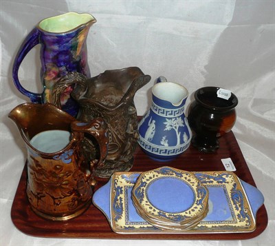 Lot 12 - A Keith Murray Wedgwood beaker vase, copper lustre jug, decorative ceramics, etc on two trays