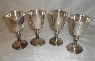 Lot 21 - A set of four silver goblets, 26oz approximately