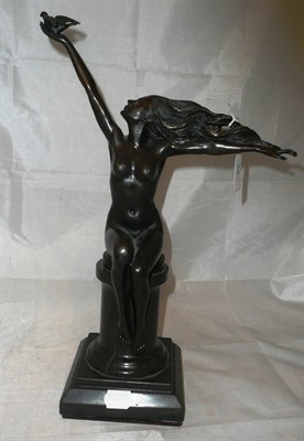 Lot 28 - An Art Deco style bronze figure nude with dove on a marble base