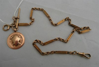 Lot 44 - A 9ct gold fancy link watch chain hung with a 9ct gold fob medallion, approx 21g